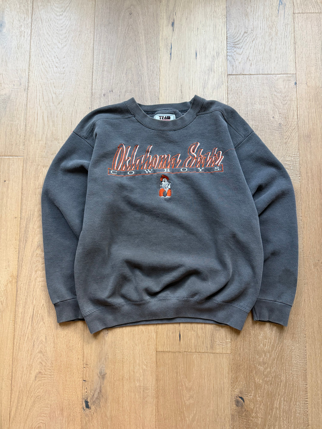 Faded Black TEAM “Oklahoma State” Script Embroidered Pete Crewneck Sweatshirt Medium